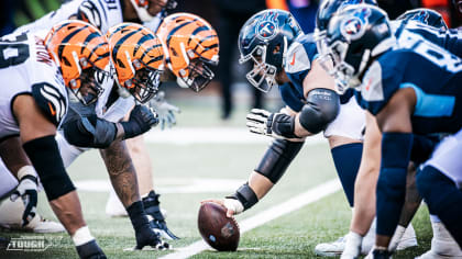 People tailgate outside Nissan Stadium before the first half of an NFL  divisional round playoff football game between the Tennessee Titans and the  Cincinnati Bengals, Saturday, Jan. 22, 2022, in Nashville, Tenn. (