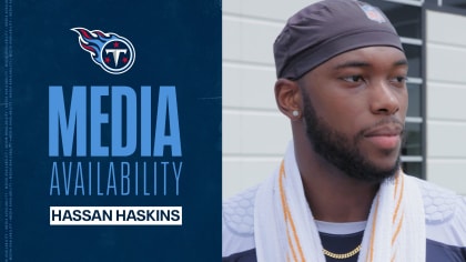 Tennessee Titans linebacker Monty Rice (56) tries to stop running back  Hassan Haskins (25) during an NFL football training camp practice  Wednesday, July 26, 2023, in Nashville, Tenn. (AP Photo/George Walker IV