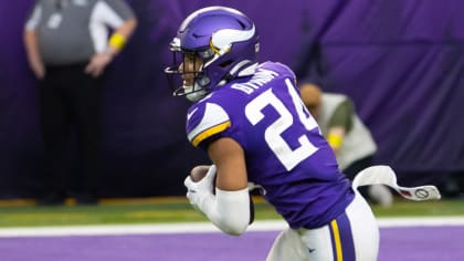 Minnesota Vikings safety Camryn Bynum (24) walks off the field