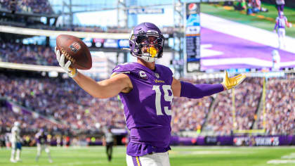 Minnesota Vikings wide receiver Adam Thielen (19) catches the pass