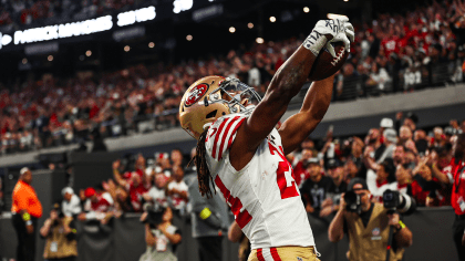 San Francisco 49ers running back Jordan Mason takes part in drills