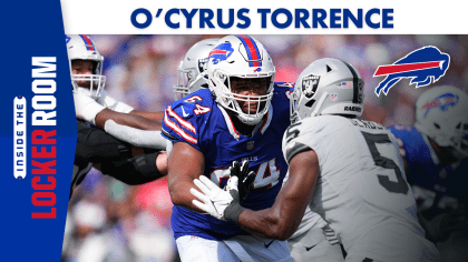 Buffalo Bills offensive lineman O'Cyrus Torrence (64) runs a drill