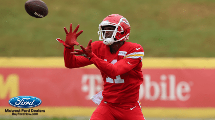 Kansas City Chiefs quarterback Dustin Crum (13) drops back during an NFL  pre-season football game against the Washington Commanders Saturday, Aug.  20, 2022, in Kansas City, Mo. (AP Photo/Peter Aiken Stock Photo 