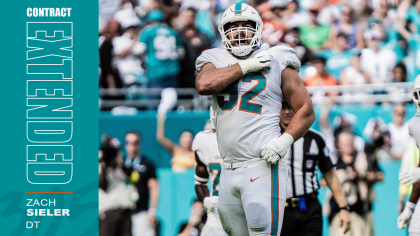 Miami Dolphins defensive tackle Zach Sieler (92) walks to the line