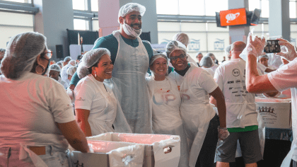 Chiefs players pack holiday meal boxes for families ahead of