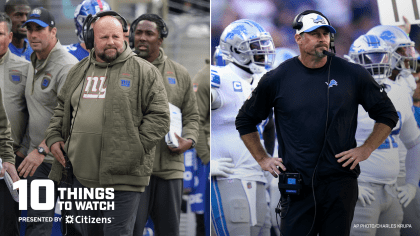 Detroit Lions head coach Dan Campbell greets linebacker James