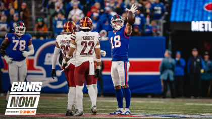 January 1, 2023, East Rutherford, New Jersey, USA: New York Giants wide  receiver Isaiah Hodgins (18) spikes the ball in the end zone after a  touchdown in the first half during a