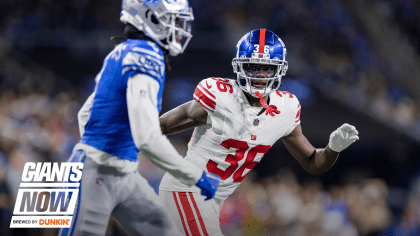 New York Giants safety Dane Belton (24) and linebacker Tomon Fox