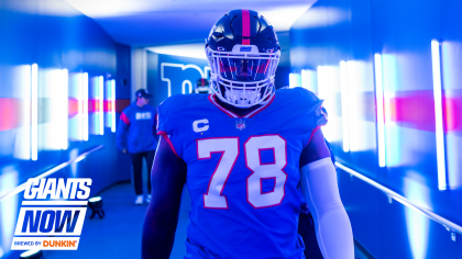 Andrew Thomas of the New York Giants looks on during the national