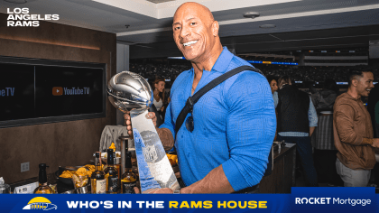 Dwayne Johnson, aka The Rock, looks onto the field before the Los Angeles  Rams play the Buffalo Bills during an NFL football game Thursday, Sept. 8,  2021, in Inglewood, Calif. (AP Photo/John