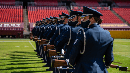 Drill Team joins Miami Dolphins in salute to veterans > Joint Base