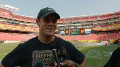 Commanders use Taylor Heinicke's image at FedEx Field in ads for