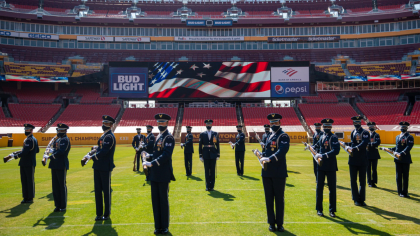 Drill Team joins Miami Dolphins in salute to veterans > Joint Base