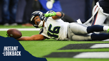 Russell Wilson delivers improbable touchdown pass to Tyler Lockett