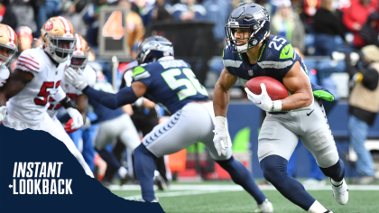 Seattle Seahawks running back Travis Homer (25) runs onto the field during  an NFL football game against the San Francisco 49ers, Sunday, Sept. 18,  2022, in Santa Clara, Calif. (AP Photo/Scot Tucker