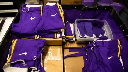 Equipment Staff Readies Uniforms For Sunday