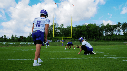 Detroit Lions place kicker Riley Patterson, right, kicks a 37-yard