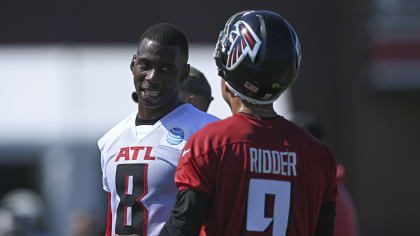 Atlanta Falcons tight end Kyle Pitts (8) participates in a jersey swap  after an NFL football game against the San Francisco 49ers, Sunday, Oct.  16, 2022, in Atlanta. The Atlanta Falcons won