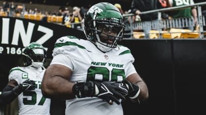 New York Jets defensive tackle Sheldon Rankins tackles Denver