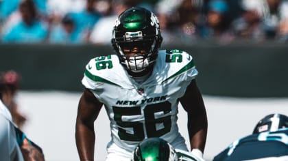 New York Jets linebacker Quincy Williams (56) reacts after a defensive play  against the New England Patriots during the fourth quarter of an NFL  football game, Sunday, Sept. 24, 2023, in East