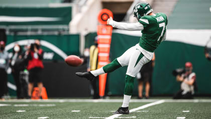 Braden Mann of the New York Jets wears a FDNY hat prior to the