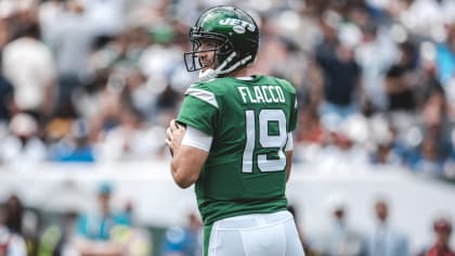 New York Jets quarterback Joe Flacco (19) drops back to pass against the  Buffalo Bills in