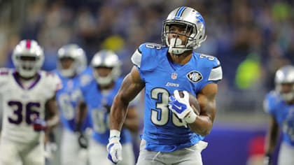 Detroit Lions running back Dwayne Washington (36) takes a kickoff during  the first half of an