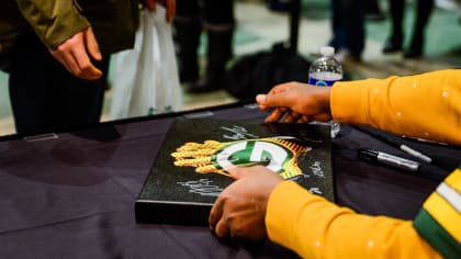 Rodgers signing autographs to benefit Salvation Army