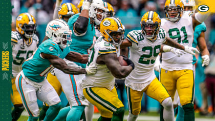 GREEN BAY, WI - DECEMBER 19: Green Bay Packers defensive tackle Jarran Reed  (90) celebrates during a game between the Green Bay Packers and the Los  Angeles Rams on December 19, 2022