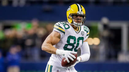 Jimmy Graham of the Seattle Seahawks watches from the sideline during