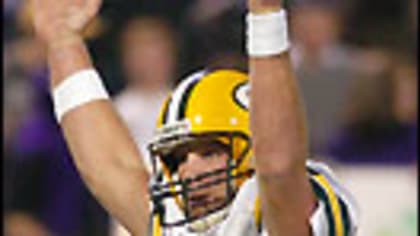 AP Story: Packers Beat Vikings to Clinch NFC North