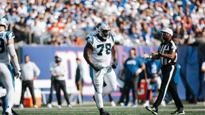 Carolina Panthers defensive tackle Derrick Brown (95) wears a Crucial Catch  t-shirt as he warms up prior to an NFL football game against the  Philadelphia Eagles, Sunday, Oct. 10, 2021, in Charlotte