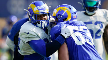 Los Angeles Rams running back Cam Akers fights through contact for a  12-yard gain