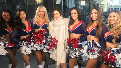 NFL cheerleaders put on a show for military families, Article