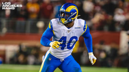 Los Angeles Rams wide receiver Odell Beckham Jr. puts on his helmet during  practice for an NFL …