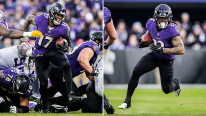 Baltimore Ravens running back Devonta Freeman (33) runs a play during the  first half of an NFL football game against the Miami Dolphins, Thursday,  Nov. 11, 2021, in Miami Gardens, Fla. (AP