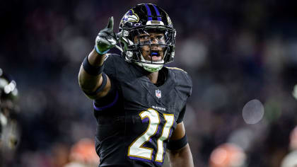 Baltimore Ravens cornerback Brandon Stephens (21) reacts to a deflected  pass during the first half of