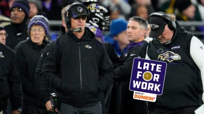 Former Raven coach Rex Ryan tosses a few passes before facing his