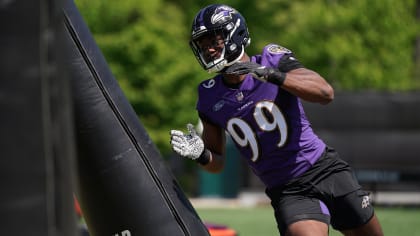 Baltimore Ravens linebacker Odafe Oweh (99) in action during the third  quarter an NFL preseason football game against the New Orleans Saints  Saturday, Aug. 14, 2021, in Baltimore. (AP Photo/Terrance Williams Stock