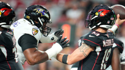 Baltimore Ravens defensive tackle Travis Jones (98) walks off the