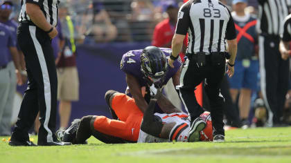 Baltimore Ravens cornerback Marlon Humphrey (44) and Cleveland Browns wide  receiver Odell Beckham (13) grab at each other during a play during the  second half of an NFL football game Sunday, Sept.