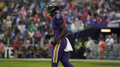 Baltimore Ravens cornerback Brandon Stephens (21) stands on the field  before the start of an NFL