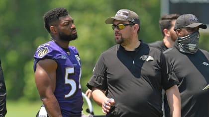 CHICAGO, IL - NOVEMBER 21: Baltimore Ravens Outside linebackers Coach Drew  Wilkins talks with outside linebacker Tyus Bowser (54) during a game  between the Chicago Bears and the Baltimore Ravens on November