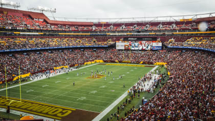 WATCH: Washington Redskins take field with hands up in support of