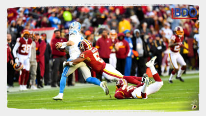 Detroit Lions running back Dwayne Washington (36) takes a kickoff during  the first half of an