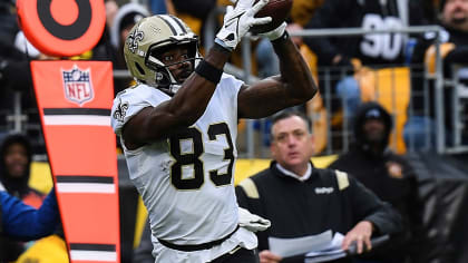 New Orleans Saints tight end Juwan Johnson (83) is tackled by San Francisco  49ers cornerback Deommod