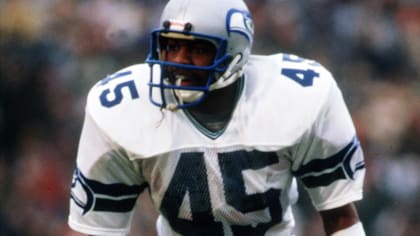 Los Angeles Raiders' veteran running back Frank Hawkins (27) heads