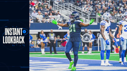 DeeJay Dallas of the Seattle Seahawks gestures to the fans during