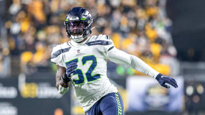 Seattle Seahawks defensive end Darrell Taylor (52) gets set during an NFL  football game against the