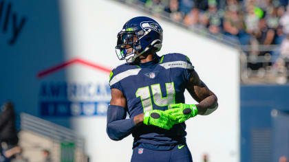 Seattle Seahawks wide receiver DK Metcalf stands on the sideline during the  second half of an NFL football game against the Tennessee Titans, Sunday,  Sept. 19, 2021, in Seattle. The Titans won